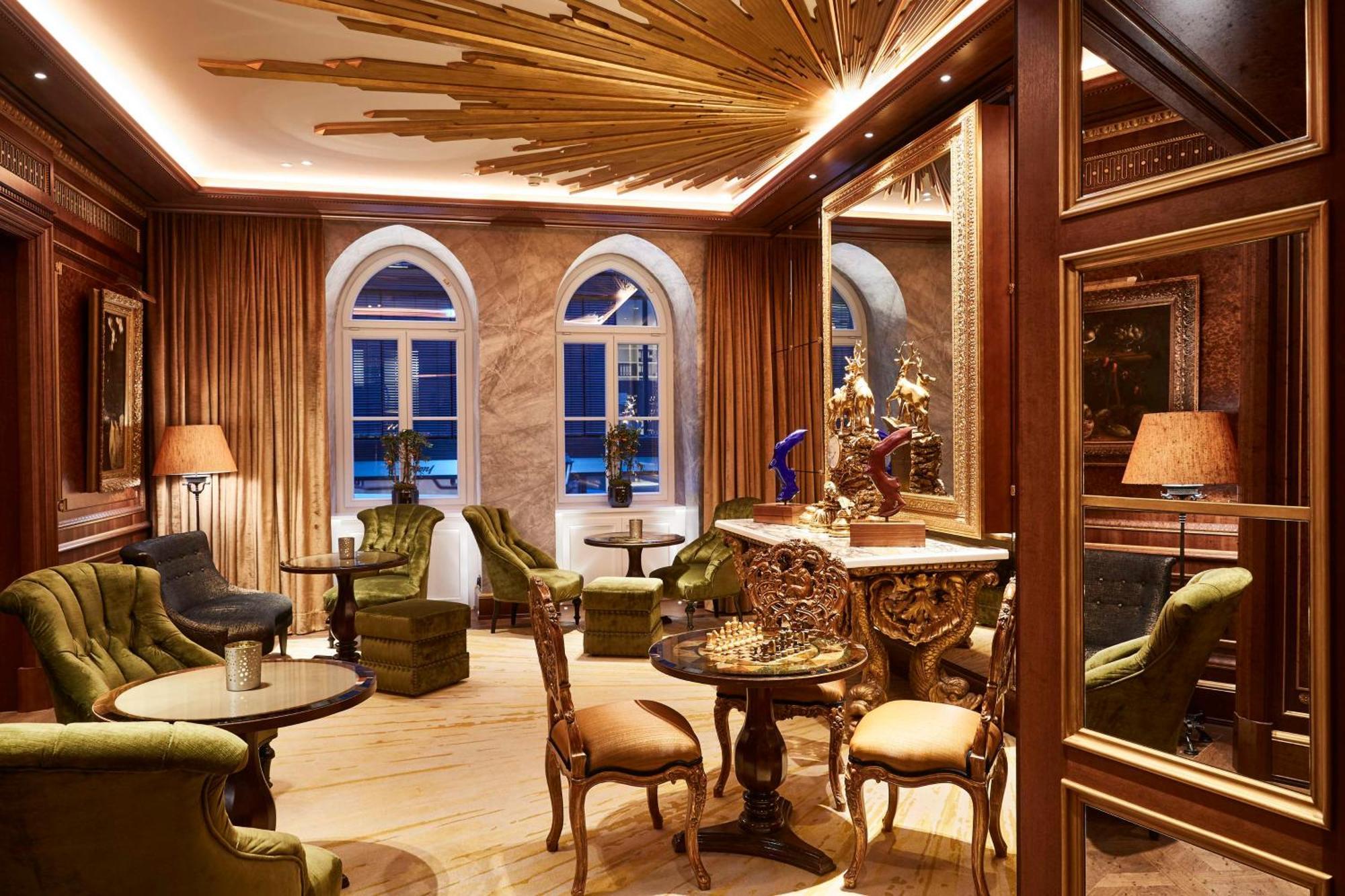 Vier Jahreszeiten Kempinski Muenchen Εξωτερικό φωτογραφία The lounge at the hotel